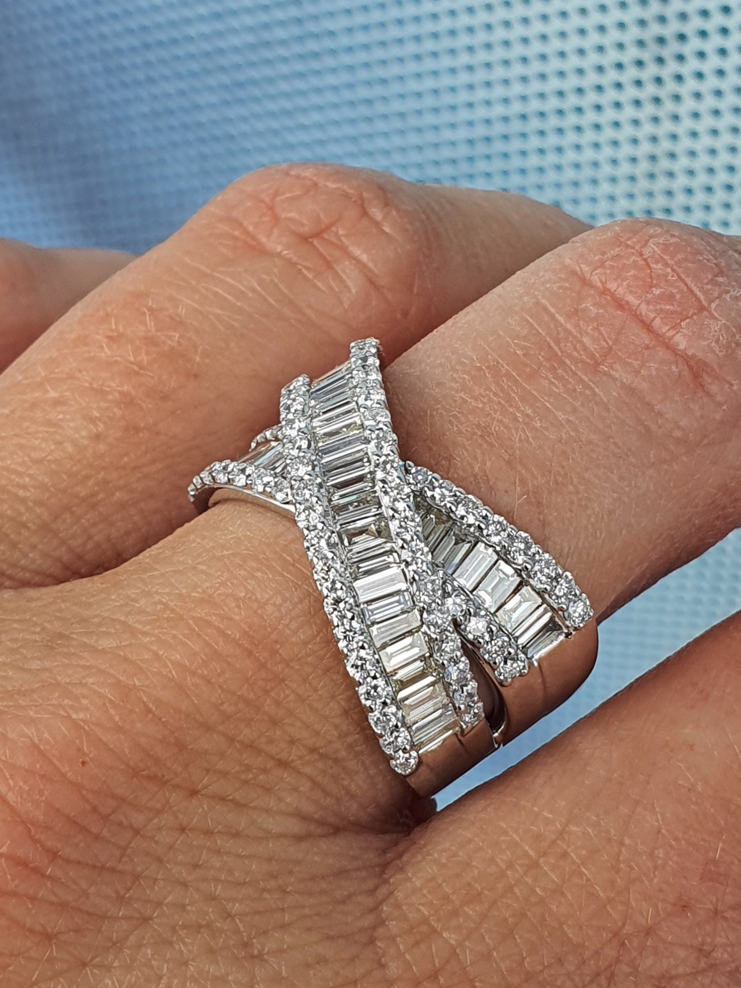 Baguette and Round Brilliant Cross Over Diamond Ring