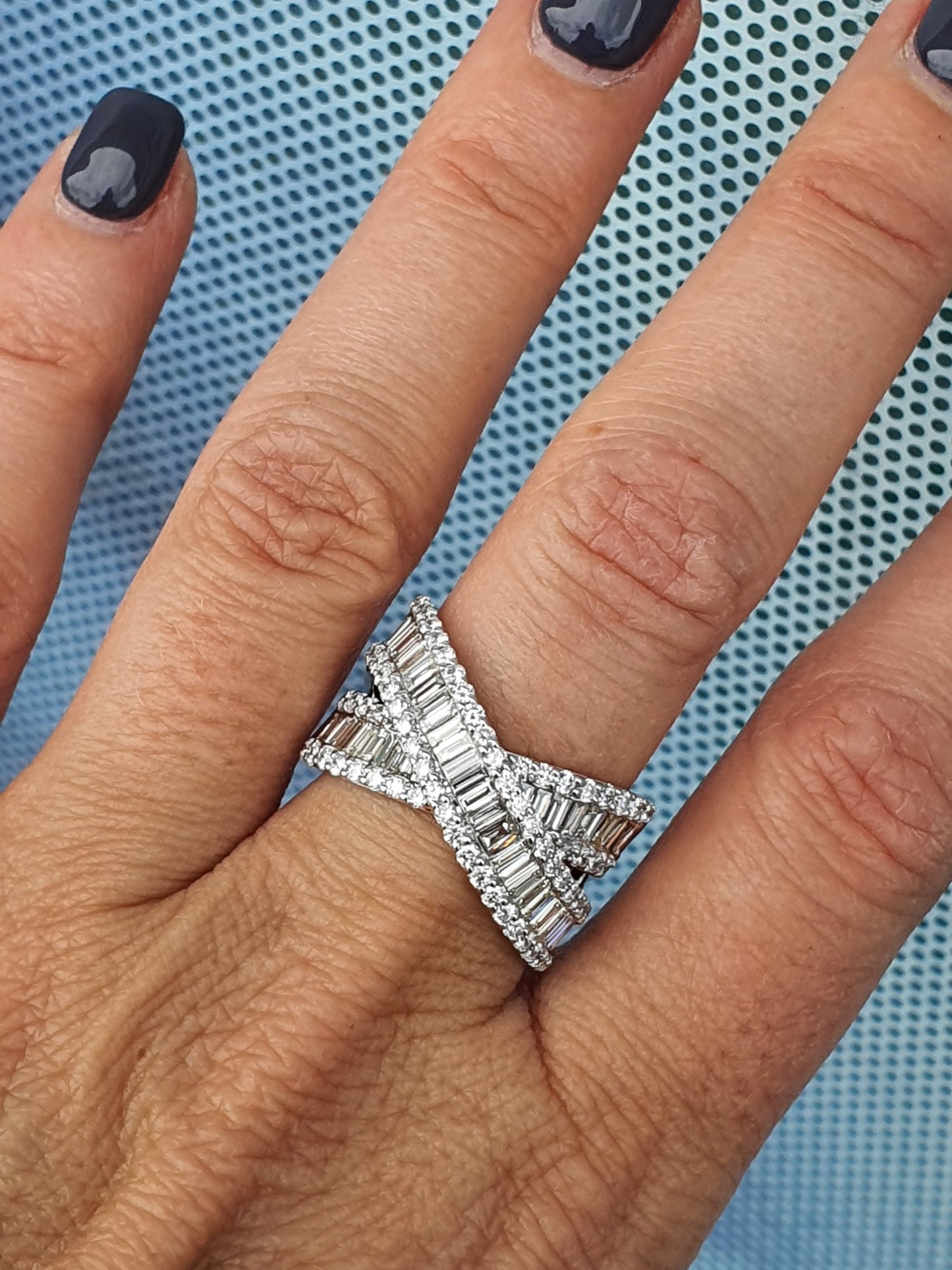 Baguette and Round Brilliant Cross Over Diamond Ring