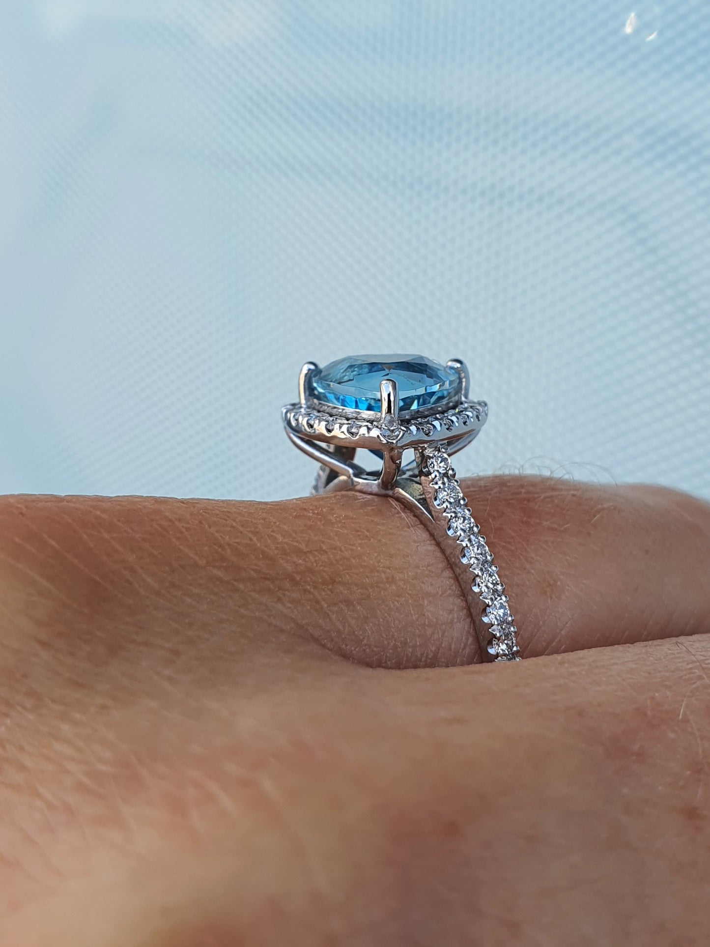 Trilliant Cut Aquamarine and Diamond Ring