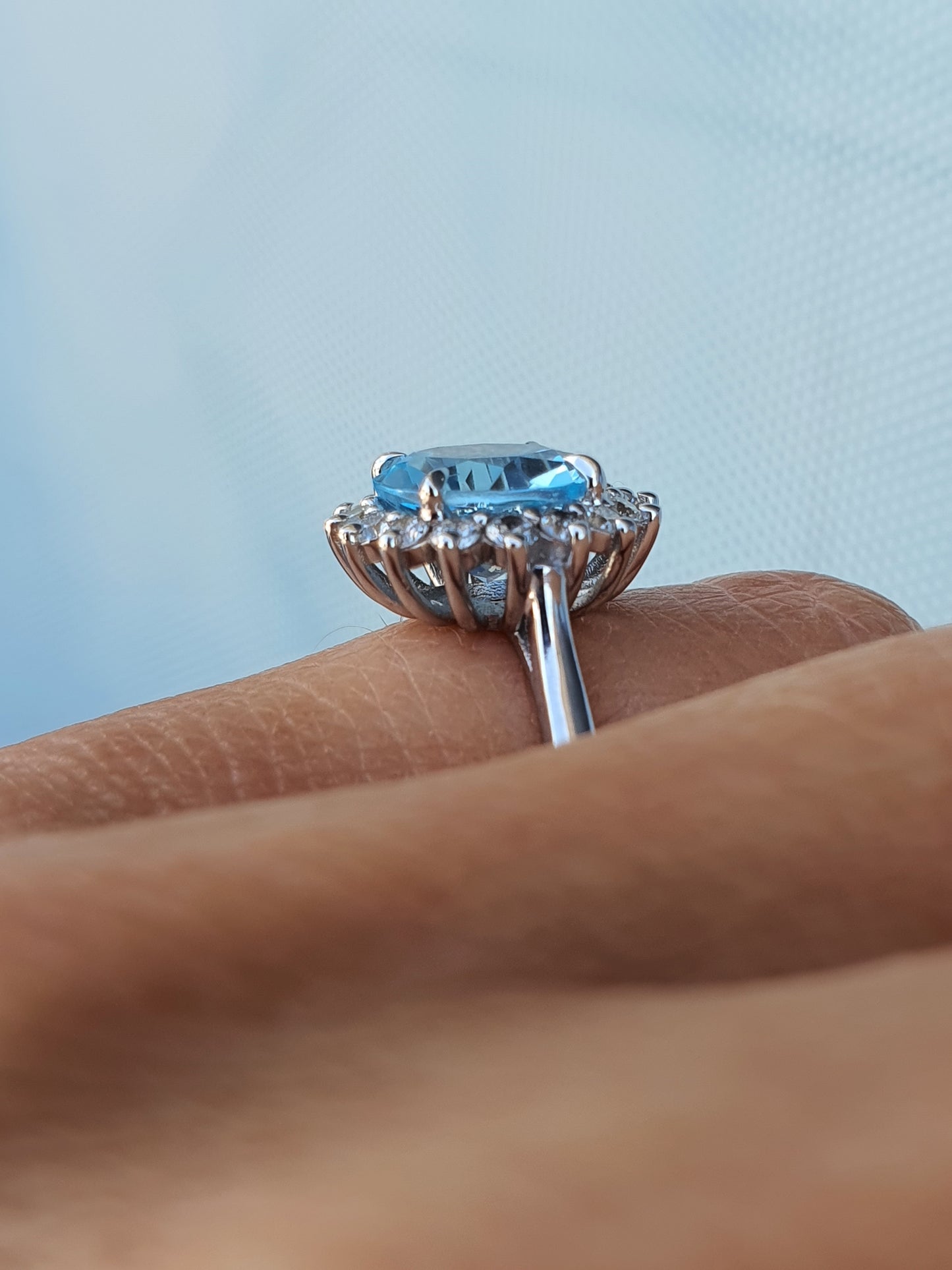 Round Aquamarine and Diamond Ring
