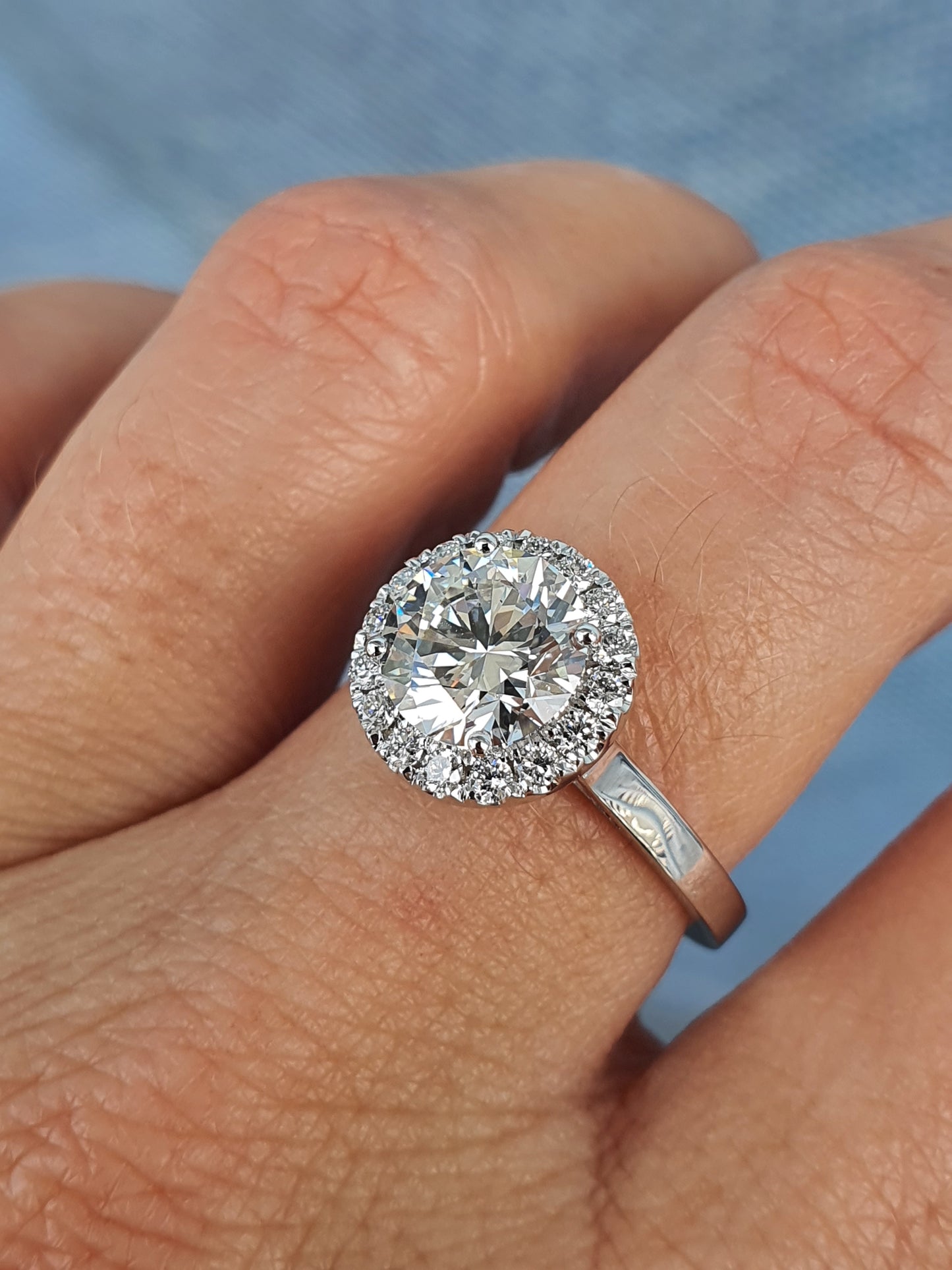 Round Halo Brilliant Sweep Up Diamond Ring